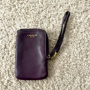 Small Coach eggplant purple leather wristlet